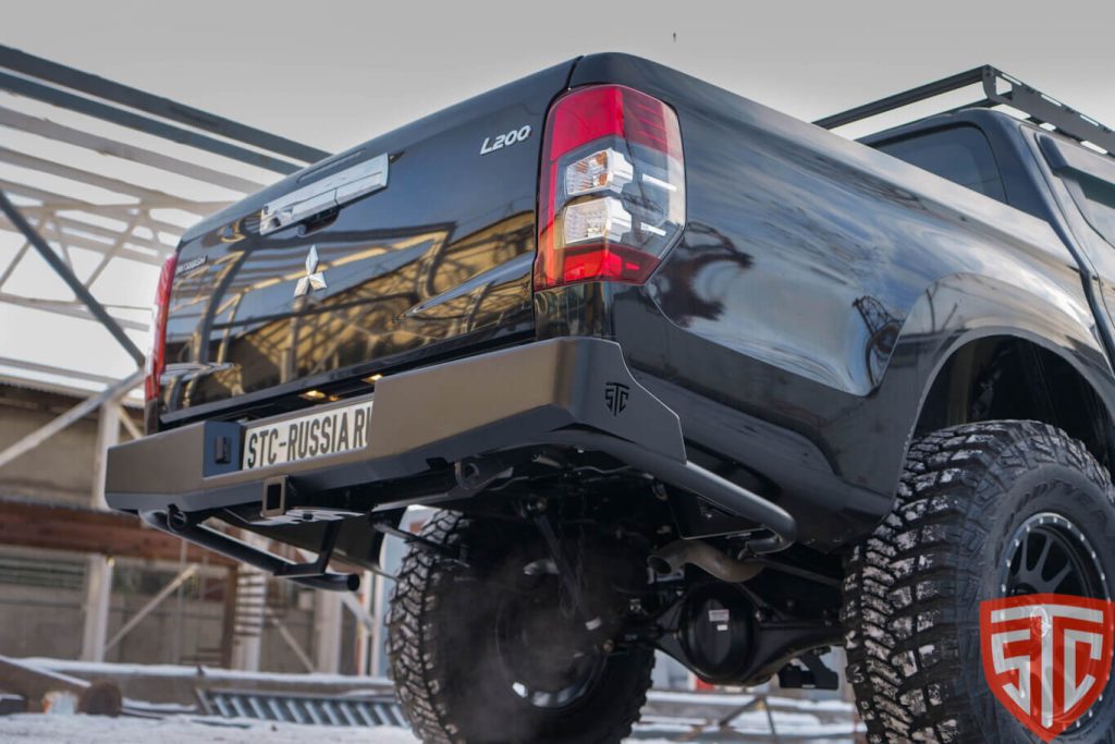 Бампер задний Mitsubishi L200 2019+ под ПТФ Бампер задний Mitsubishi L200 2019+ под ПТФ